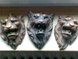 TÃªtes de lion bois sculptÃ© - fin XVIIIe