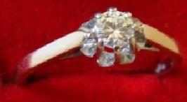 Bague AU750 blanc sertie d'un diamant monture basse - 0.20 c