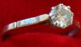 Bague AU750 blanc sertie d'un diamant monture haute - 0.30 c